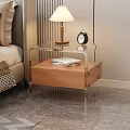 Transparent Frame Bedside Table with Wooden Drawer Alarm Clock Books and Table Lamp in Bedroom