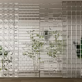 Transparent Glass Block Room Divider With Geometric Patterns And Green Plants