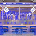 Modern Restaurant Interior With Blue Accents Neon Lights Exposed Pipes And Glass Counters