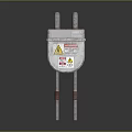 Silver Cased Industrial Equipment With Warning Labels And Curved Pipes