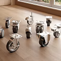 Various Metal Casters With Swivel And Fixed Wheels On Wooden Floor