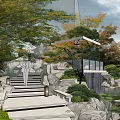 Garden Landscape Design with Lush Trees Rocks Waterfall Pavilion and Green Lawn