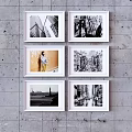 Colorful City Landscape Painting With Black And White Art Frames On Wall