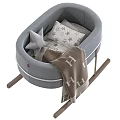 Gray Rocking Baby Crib With Metal Frame Wooden Rockers Star Patterned Pillows And Striped Blanket