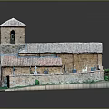 Miniature Building Model Scene with Tower Red Roof Tiles Blue Objects and Green Grass