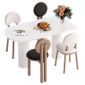 White Oval Dining Table Set With Four Chairs Fruit Bowl Magazine And Flower Vase