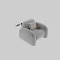 Modern Beige Single Sofa With Black And White Geometric Pillow And Brown Decorative Ball