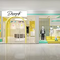 Divinefit Clothing Store With Bright Yellow White Decor And Mannequins Displaying Outfits