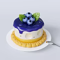 Delicious Blueberry Cake With Purple Frosting Green Leaves And Cookie Border On White Plate