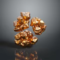 Golden Irregular Stone And Wood Pieces With Glossy Surface And Dark Background Reflections