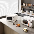 Modern Kitchen Countertop With White Microwave Toaster Oven And Sandwiches Croissants
