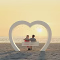 Romantic Heart Shaped Playground Equipment With Bench And Hanging Lights At Beach Sunset