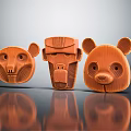 Textured Wooden Sculptures Of Animal Heads And Human Face With Reflective Surface
