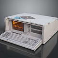 Vintage White Computer With Display Screen Keyboard And Disk Drive