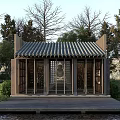 Traditional Chinese Religious Shrine With Tile Roof Wooden Structure By Waterfront Surrounded by Green Trees