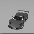Silver High Performance Sports Car with Sleek Aerodynamic Design Large Rear Spoiler and Alloy Wheels
