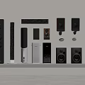 Assorted Headphone Speaker Types Including Floor Standing Bookshelf Compact Black Silver on White Shelf