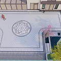 Stunning Courtyard Garden Design With Stone Pathway Decorative Wall Colorful Flower Beds And Green Trees
