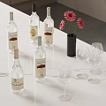 Elegant Marble Countertop With Glass Bottles Wine Glasses And Flower Vase