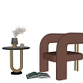 Modern Side Table With Vase Dried Flowers And Brown Chair Near Open Book
