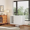 White Entryway Cabinet And Side Cabinet With Wooden Legs Near Window And Green Plants