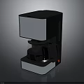 Sleek Modern Black And Silver Coffee Maker With Stainless Steel Body And Glass Carafe
