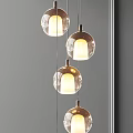Modern Chandeliers With Curved Spiral And Glass Globe Designs For Illuminated Interior Decor