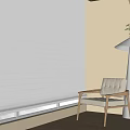 White Venetian Blinds Filtering Sunlight through Window in Modern Interior With Armchair