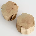 Two Natural Wood Tree Stump Shaped Stools With Rustic Texture And Tree Rings