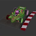 Gold March 761 Race Car With Number 55 Driver And Red White Barriers