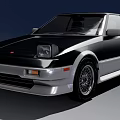 Classic Black Silver Two Door Sports Car Featuring Sleek Body And Alloy Wheels