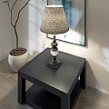 Elegant Table Lamp With Fabric Shade On Black Side Table And Decorative Painting