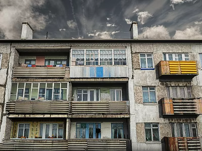 Old Apartment Building Exterior With Multiple Floors And Colorful Balconies Under Cloudy Sky 3d model