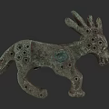 Ancient Bronze Animal Ornament With Circular Holes And Decorative Details