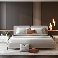 Modern Double Bed With White Sheets Gray Blanket Decorative Pillows And Wooden Nightstands On Both Sides