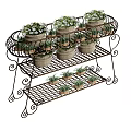 Bonsai Potted Plants on Iron Two Tier Plant Stand with Woven Baskets and Green Foliage