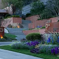 Landscape Garden Design with Red Brick Walls Steps Green Plants and Purple Flowers