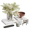 Stylish Decorative Ornament Set With Glass Vase White Flowers Brown Bowl Stacked Books And Candle