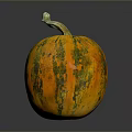 Round Orange And Green Striped Pumpkin With Green Stem On Dark Background