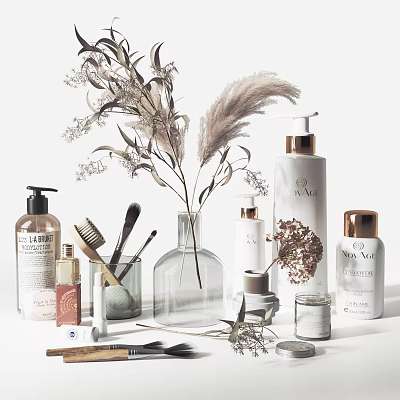 Elegant Perfume And Cosmetics Display With Luxury Bottles Makeup Brushes And Floral Accents 3d model