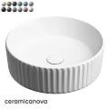 White Ceramic Countertop Washbasin With Vertical Ribbed Design And Central Drain