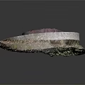 Manhole Cover With Metal Frame On Circular Concrete Base And Mossy Edges