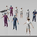 Group of Medical Professionals in Different Colored Uniforms Standing Together