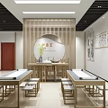 Traditional Leisure Area With Wooden Tables Calligraphy Paintings And Potted Plants
