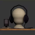 Headphones and Microphone Electronic Device on Mannequin Head Display with Wooden Base