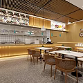 Modern Restaurant Interior With Wooden Decor Dining Tables Rattan Chairs And Hanging Lights