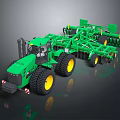 Green Agricultural Tractor With Attached Cultivator And Large Yellow Rim Wheels