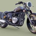Vintage Black Motorcycle With Spoke Wheels Headlight Exposed Engine And Leather Saddlebag