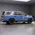 Blue Police SUV With Black Wheels Front Guard And Badge In Gray Indoor Space