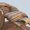Vintage Horse Drawn Carriage With Wooden Wheels Striped Blankets And Straw Accents